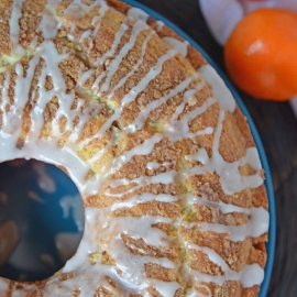 Sour Cream Coffee Cake is an easy coffee cake recipe with a streusel ribbon and crumb topping. Super moist without being overly sweet. Perfect for brunch or dessert. #sourcreamcoffeecake #easycoffeecakerecipe www.savoryexperiments.com