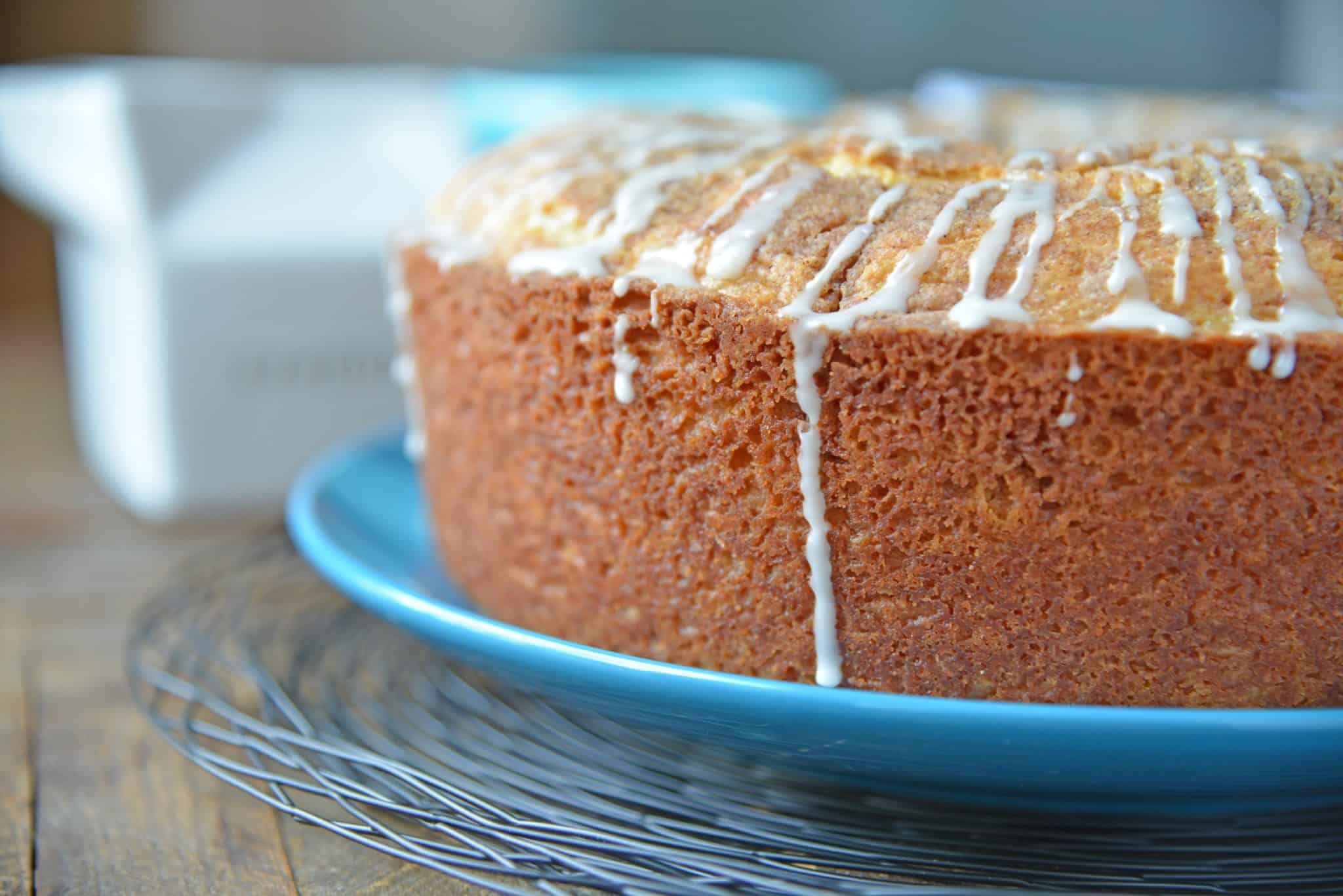 Sour Cream Coffee Cake is an easy coffee cake recipe with a streusel ribbon and crumb topping. Super moist without being overly sweet. Perfect for brunch or dessert. #sourcreamcoffeecake #easycoffeecakerecipe www.savoryexperiments.com 