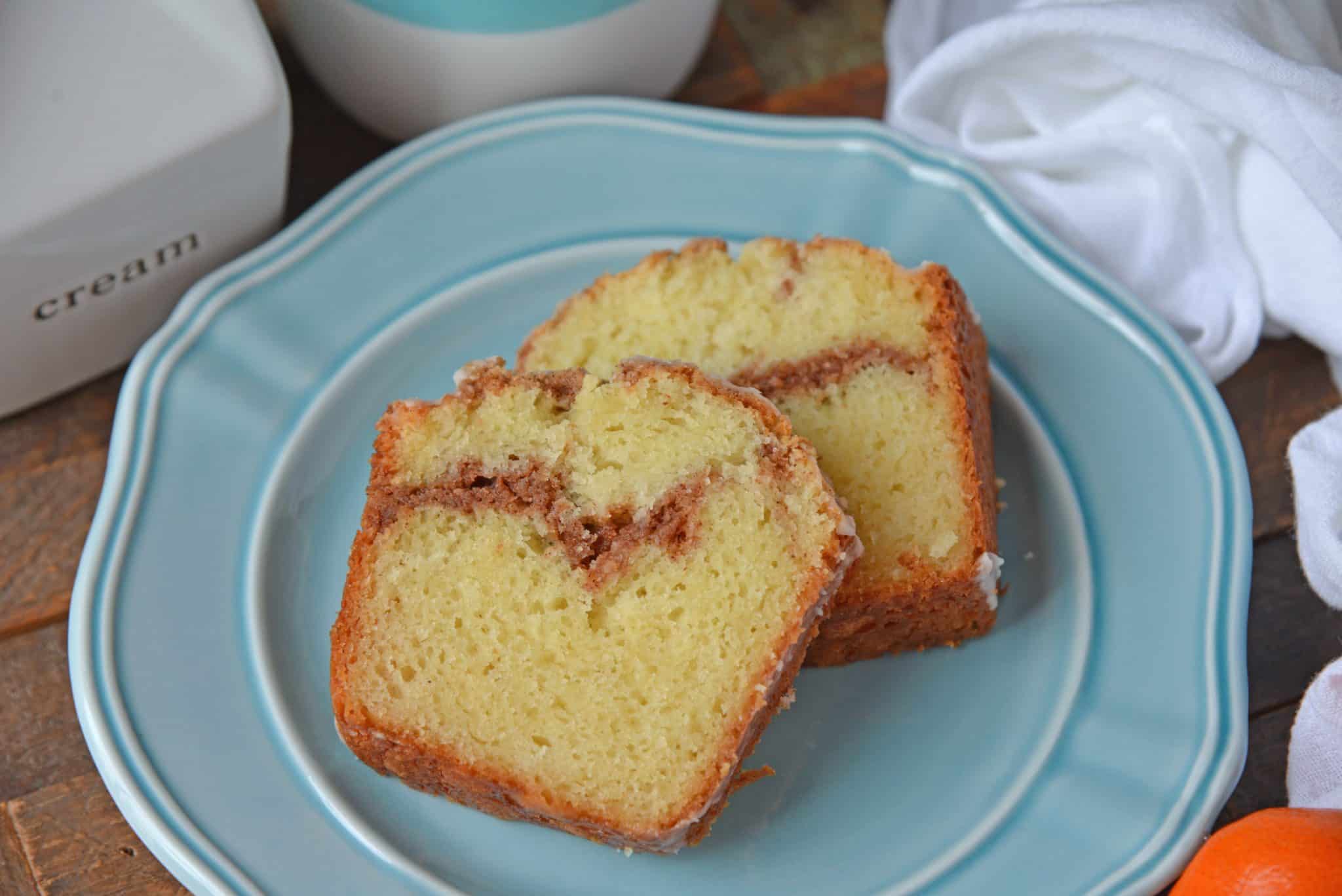 Sour Cream Coffee Cake is an easy coffee cake recipe with a streusel ribbon and crumb topping. Super moist without being overly sweet. Perfect for brunch or dessert. #sourcreamcoffeecake #easycoffeecakerecipe www.savoryexperiments.com 