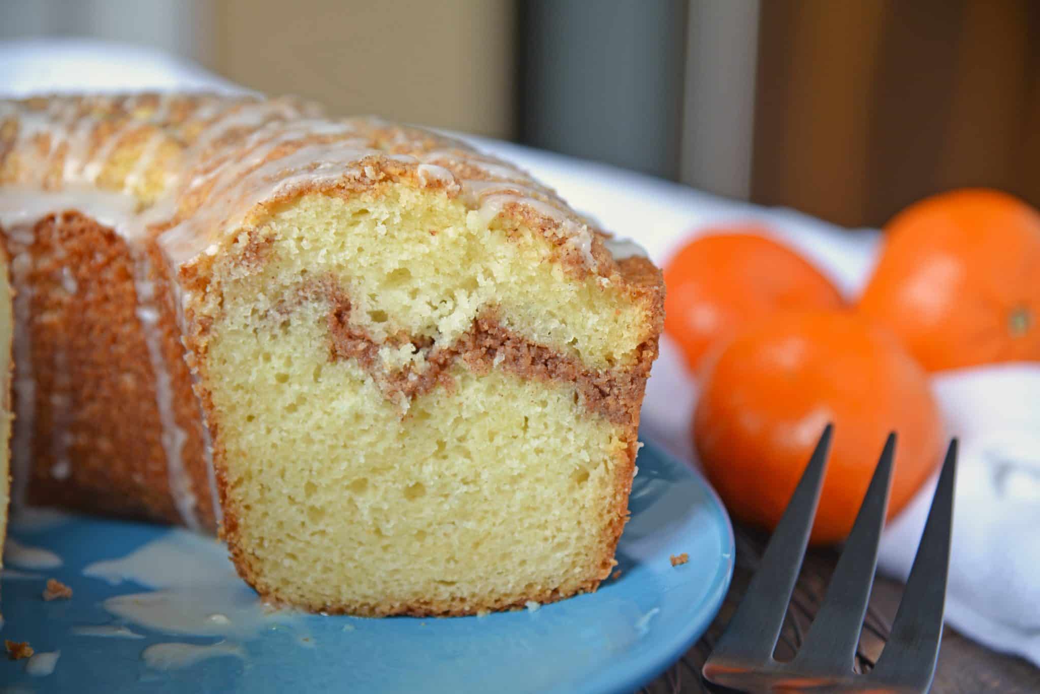 Sour Cream Coffee Cake is an easy coffee cake recipe with a streusel ribbon and crumb topping. Super moist without being overly sweet. Perfect for brunch or dessert. #sourcreamcoffeecake #easycoffeecakerecipe www.savoryexperiments.com 