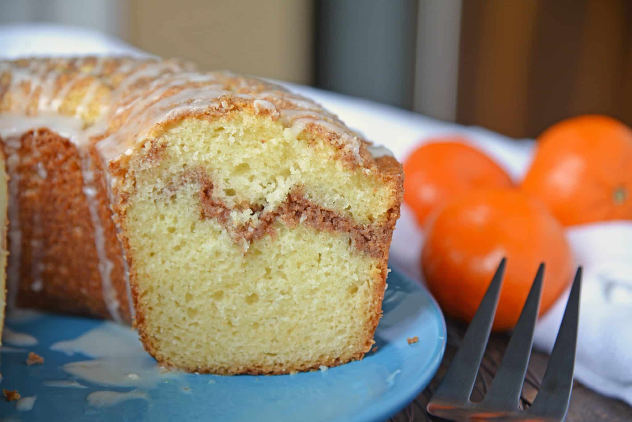 Sour Cream Coffee Cake is an easy coffee cake recipe with a streusel ribbon and crumb topping. Super moist without being overly sweet. Perfect for brunch or dessert. #sourcreamcoffeecake #easycoffeecakerecipe www.savoryexperiments.com 