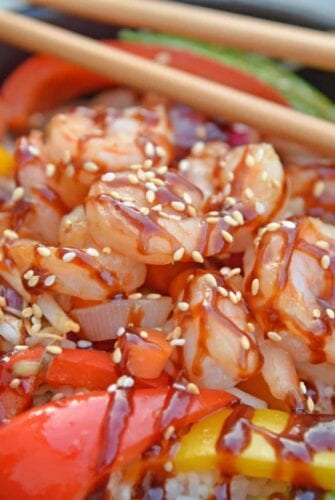 Skip the takeout and make this easy Teriyaki Shrimp Stir Fry instead! This Shrimp Stir Fry is an easy weeknight meal that the whole family will love! Best served with fried rice or noodles and packed full of veggies, this healthy recipe is sure to be a hit! #shrimpstirfry #teriyakirecipes #recipesthatuseteriyakisauce #teriyakishrimpstirfry #savoryexperiments