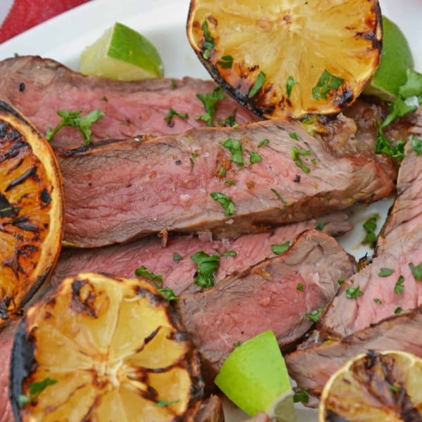 close up of citrus steak rub with charred lemons
