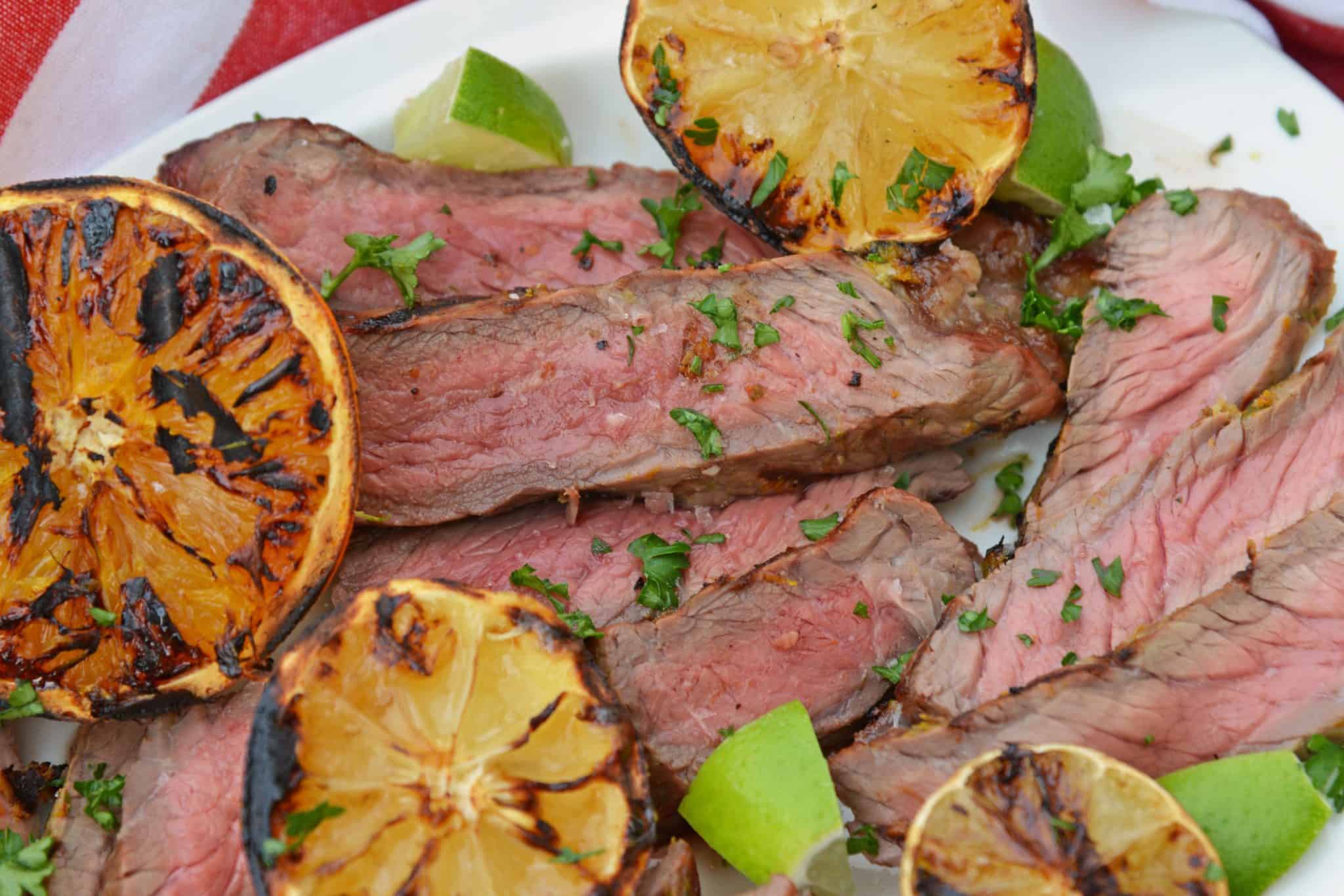 close up of citrus steak rub with charred lemons