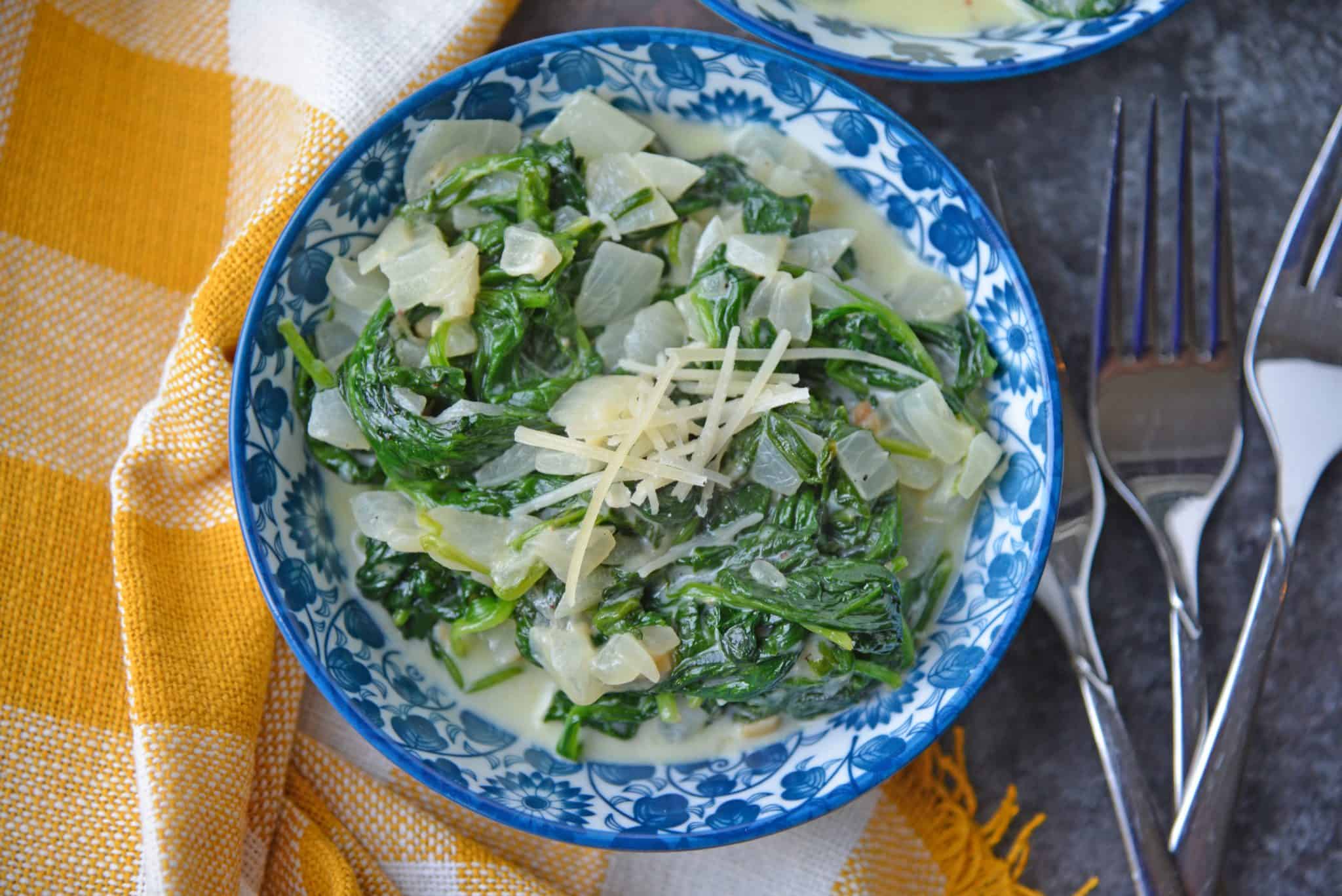 If you are wondering how to make creamed spinach, look no further! This easy creamed spinach recipe makes the perfect side dish to any meal. #creamedspinachrecipe #easycreamedspinach www.savoryexperiments.com