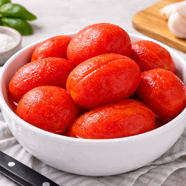 bowl of peeled roma tomatoes