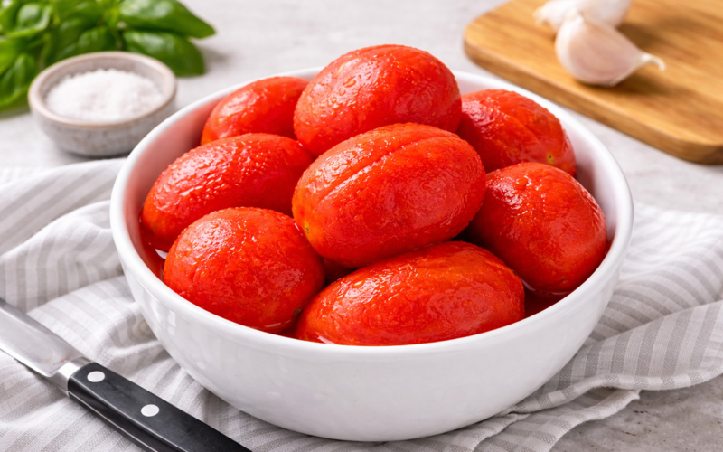 bowl of peeled roma tomatoes