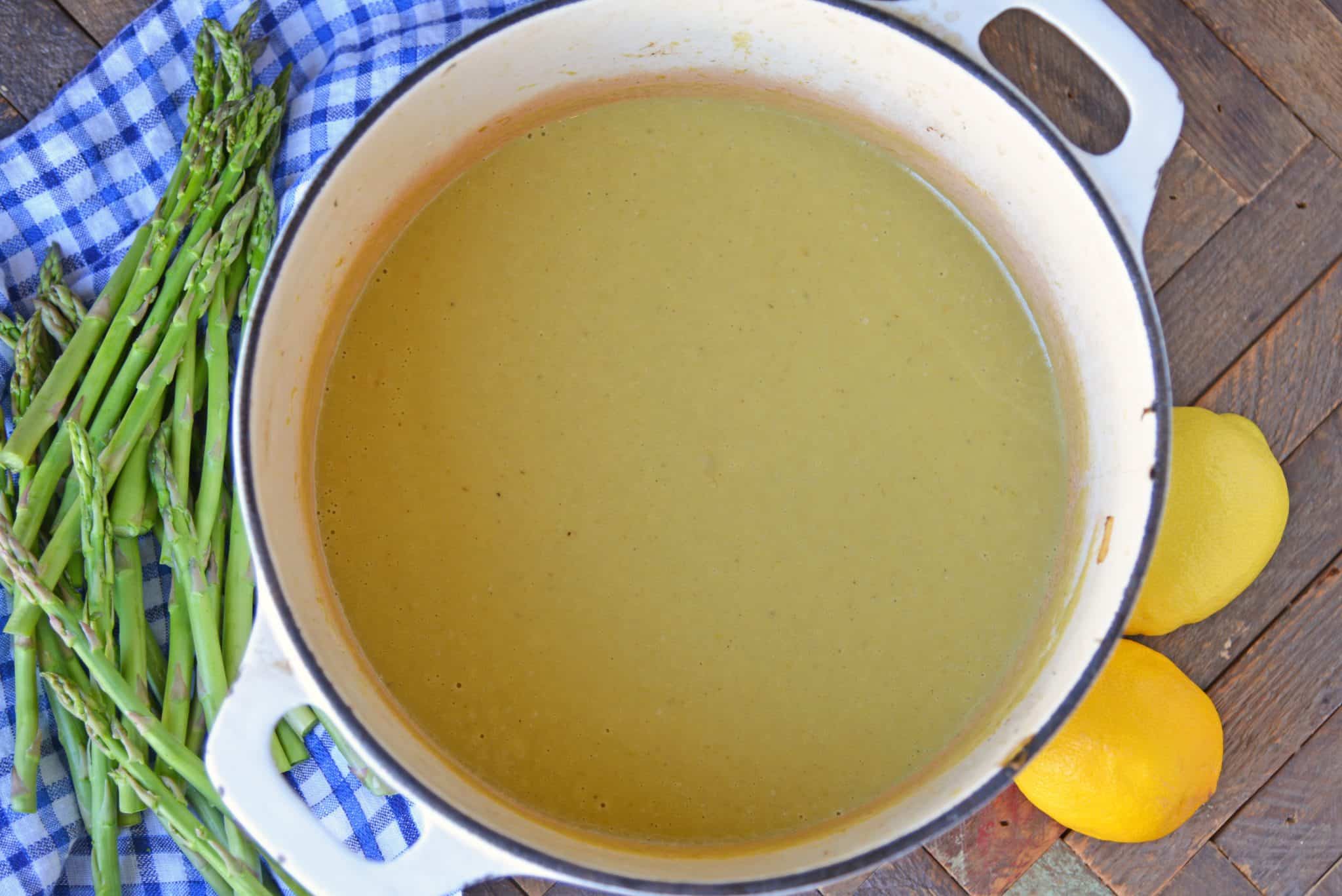 Asparagus lovers will love this creamy asparagus soup! Deliciously smooth and flavored to perfection, this cream of asparagus soup makes the perfect appetizer! #asparagussoup #creamofasparagussoup #creamyasparagussoup www.savoryexperiments.com