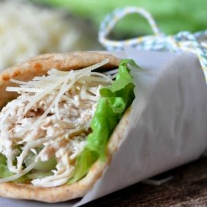 Chicken caesar pita tied with a string