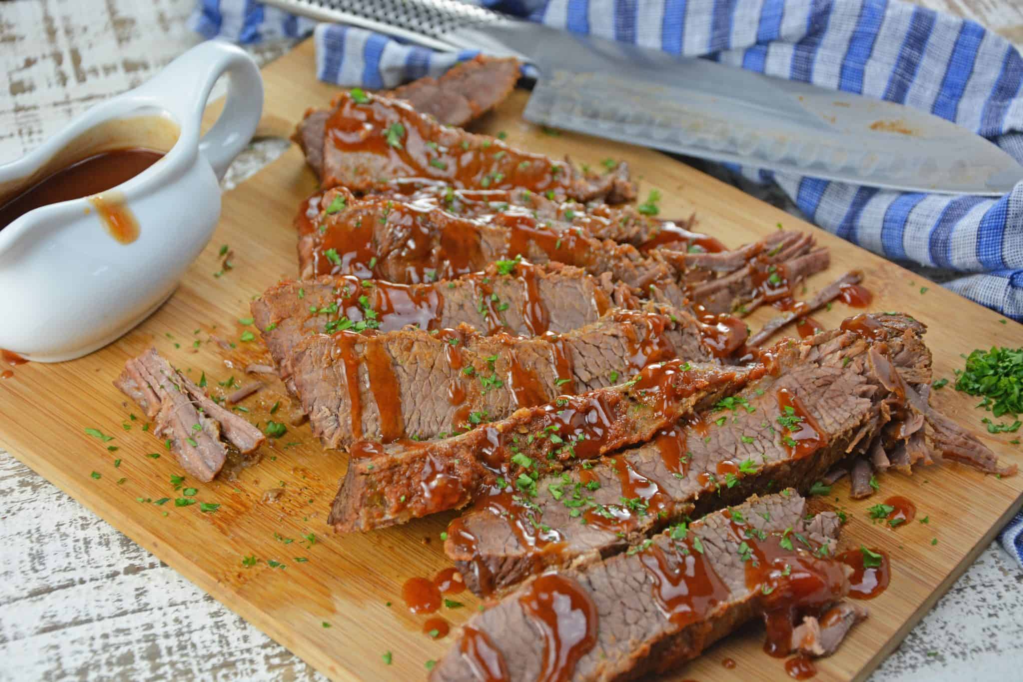 Instant Pot BBQ Brisket is the perfect dinner idea! Brisket will stay moist and offer loads of flavor.#instantpotrecipes #BBQbrisket www.savoryexperiments.com 