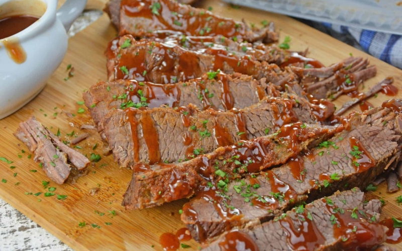 BBQ brisket slices on a cutting board - quick and easy meals