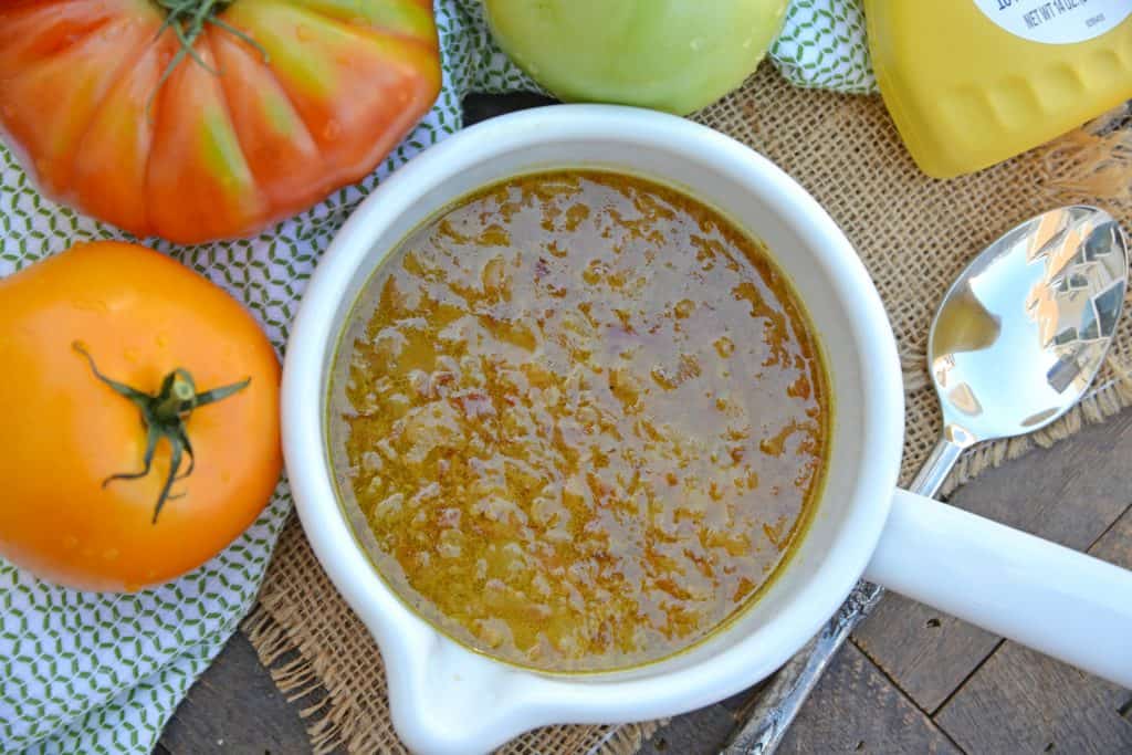 Tomato Salad with Mustard Bacon Dressing is the ultimate summer side dish using lush tomatoes, avocado mozzarella basil. Make it ahead for any party or BBQ. #tomatosalad #tomatorecipes www.savoryexperiments.com