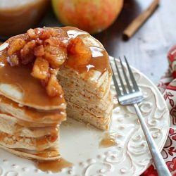 Applesauce pancakes on a white plate
