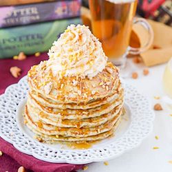 Stack of butterbeer pancakes on a white plate