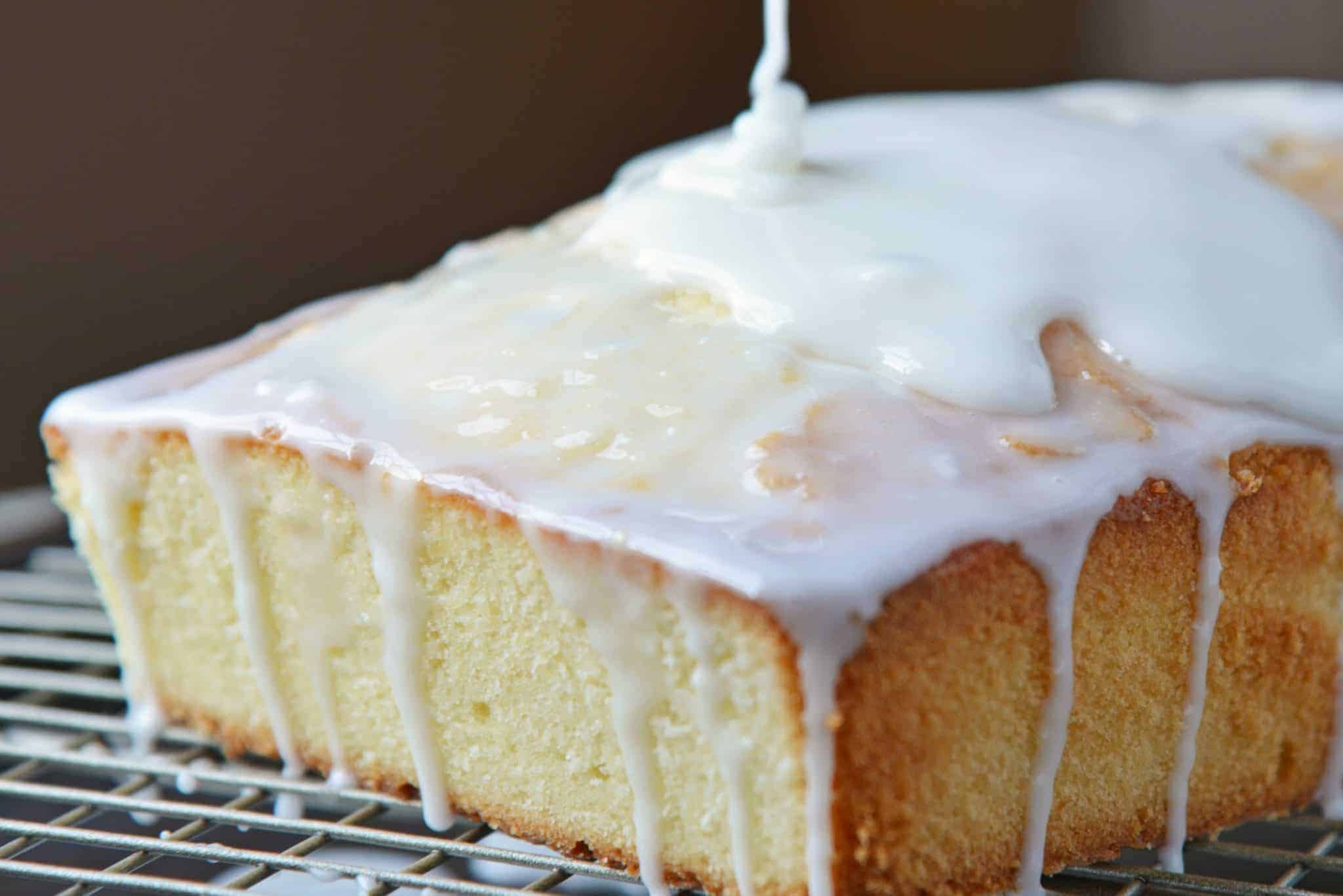 This Almond Pound Cake recipe is easy, moist and as dense as a pound cake should be. Topped with an almond pound cake glaze, it's the perfect dessert! #almondpoundcake #poundcakerecipe www.savoryexperiments.com