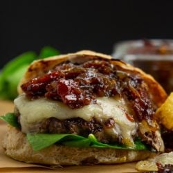 straight on shot of bacon onion jam burger