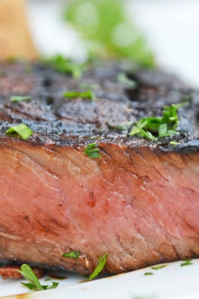 The BEST Easy Steak Marinade will be the only marinade you ever use in the future! You only need 3 ingredients and 30 minutes for this steak marinade. #steakmarinade #beststeakmarinade www.savoryexperiments.com