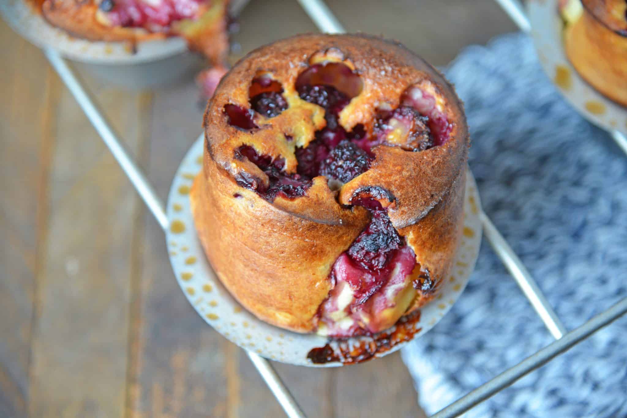 These Blackberry Popovers are a true melt-in-your-mouth breakfast treat, guaranteed to impress guests. Easier to make than you think, too! #popovers #popoverrecipe #bestpopovers www.savoryexperiments.com