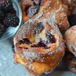 These Blackberry Popovers are a true melt-in-your-mouth breakfast treat, guaranteed to impress guests. Easier to make than you think, too! #popovers #popoverrecipe #bestpopovers www.savoryexperiments.com