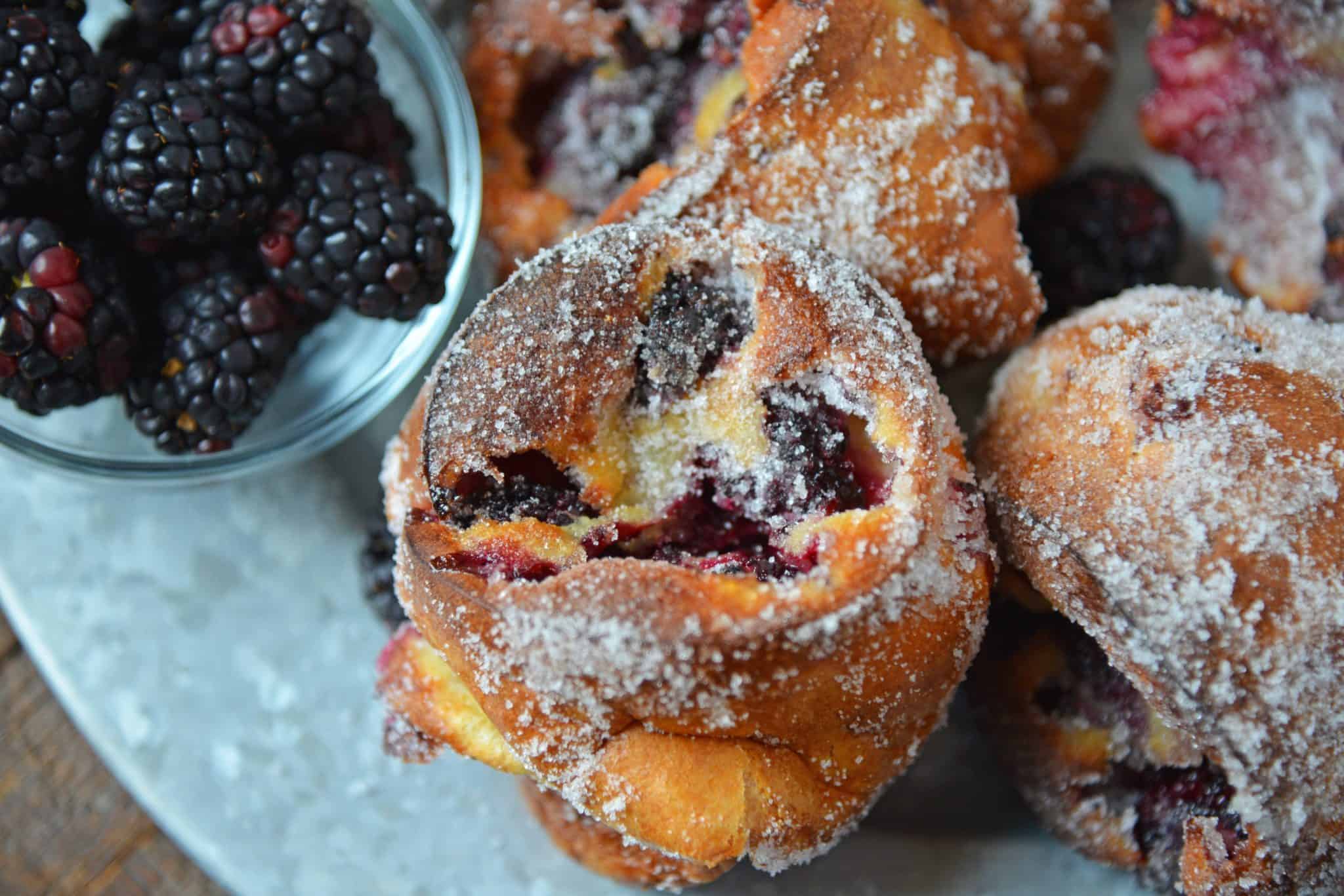 These Blackberry Popovers are a true melt-in-your-mouth breakfast treat, guaranteed to impress guests. Easier to make than you think, too! #popovers #popoverrecipe #bestpopovers www.savoryexperiments.com