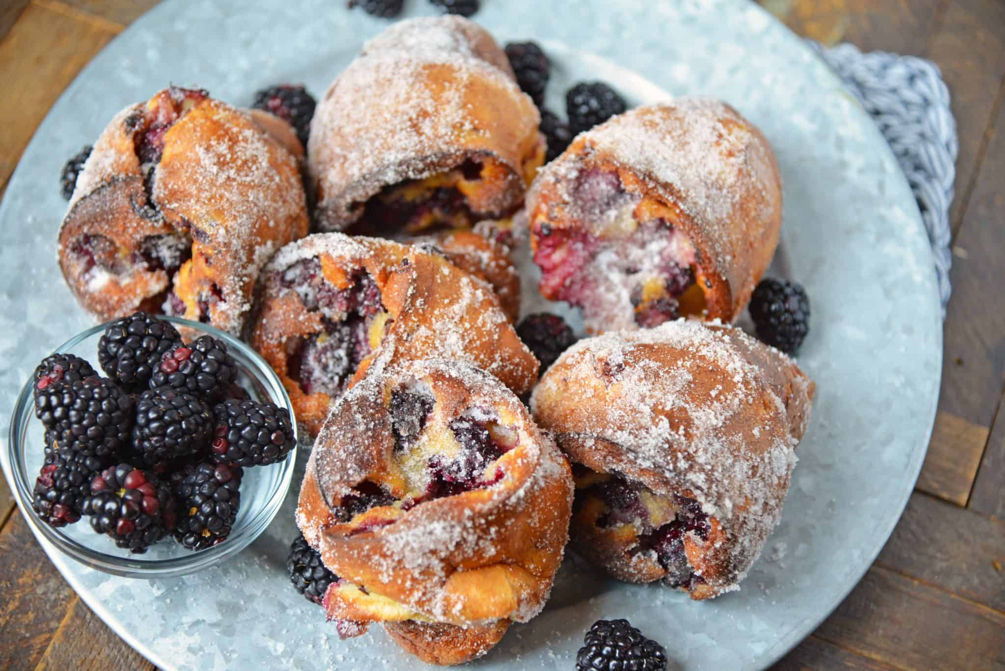 These Blackberry Popovers are a true melt-in-your-mouth breakfast treat, guaranteed to impress guests. Easier to make than you think, too! #popovers #popoverrecipe #bestpopovers www.savoryexperiments.com