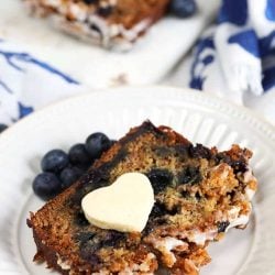 Blueberry banana bread with a pad of butter