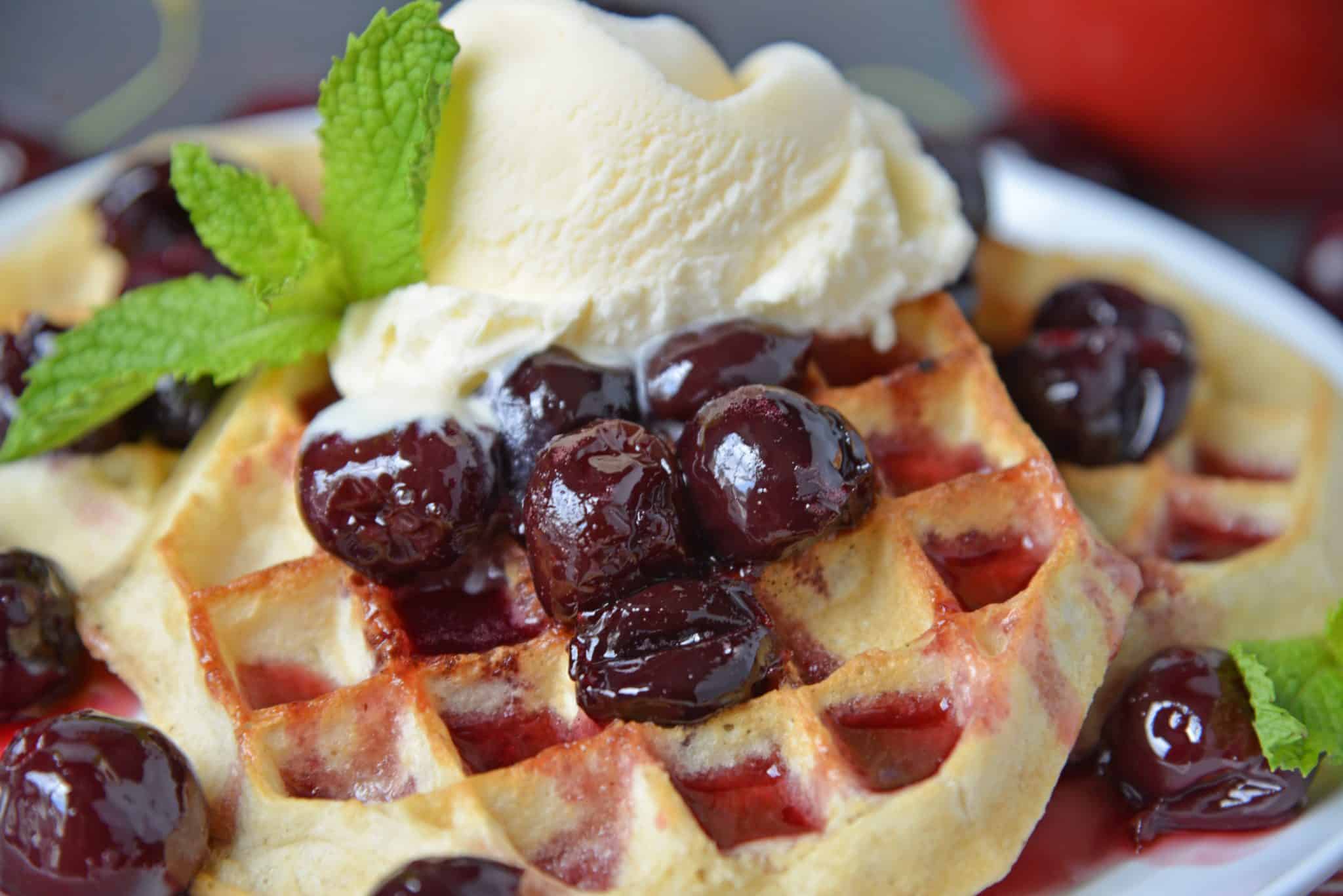 This Fresh Cherry Sauce is a yummy way to use fresh cherries. Spoon over ice cream, cake, waffles and more! #cherrysaucerecipe #freshcherryrecipes #desserttoppings www.savoryexperiments.com