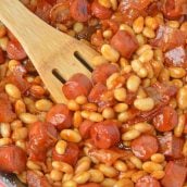 This Franks and Beans recipe, aka Beanie Weenies, is made with real beef hot dogs and less sugar than the canned version. Perfect as a quick and easy lunch or a classic camping food! #franksandbeans #homemadebeanieweenies www.savoryexperiments.com