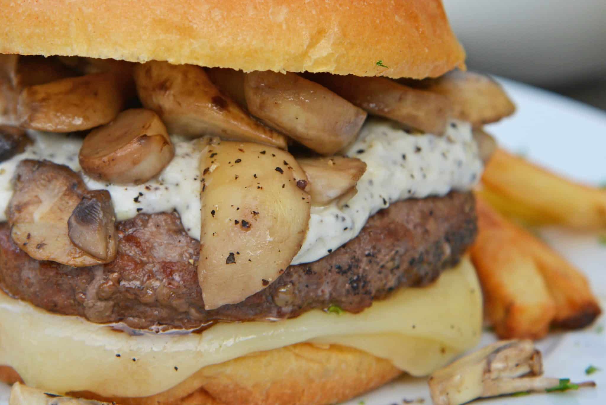 Close up of truffle mushroom burger with truffle aioli 