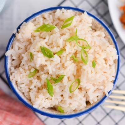 overhead bowl of ginger rice with scallions