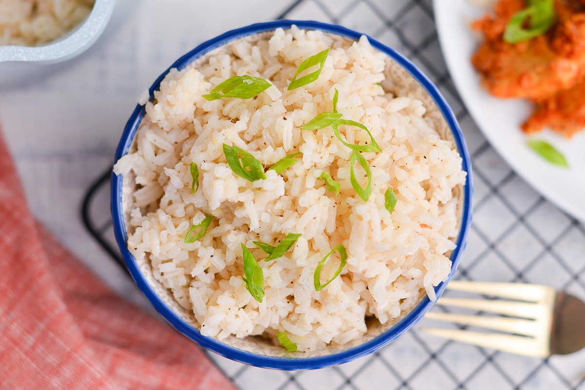 overhead bowl of ginger rice with scallions