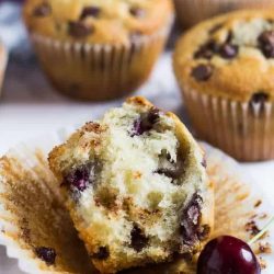 Half of a chocolate chip cherry muffin