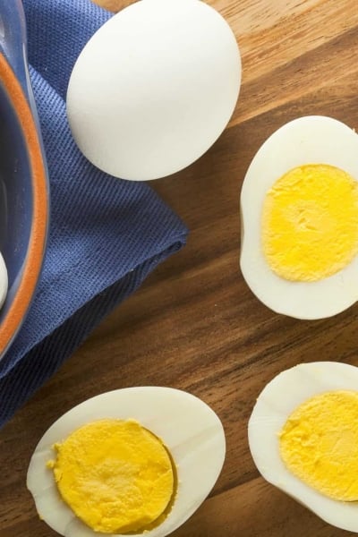 If you have an Instant Pot and haven't tried these Instant Pot Hard Boiled Eggs, you're missing out! Perfect hard boiled eggs every time. Ready in 10 minutes! #Howtohardboileggs #instantpothardboiledeggs www.savoryexperiments.com