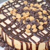 Instant Pot Peanut Butter Cheesecake is a rich and creamy cheesecake with a graham cracker crust, layer of chocolate and topped with peanut butter and chocolate chips. #instantpotcheesecake #peanutbuttercheesecake www.savoryexperiments.com