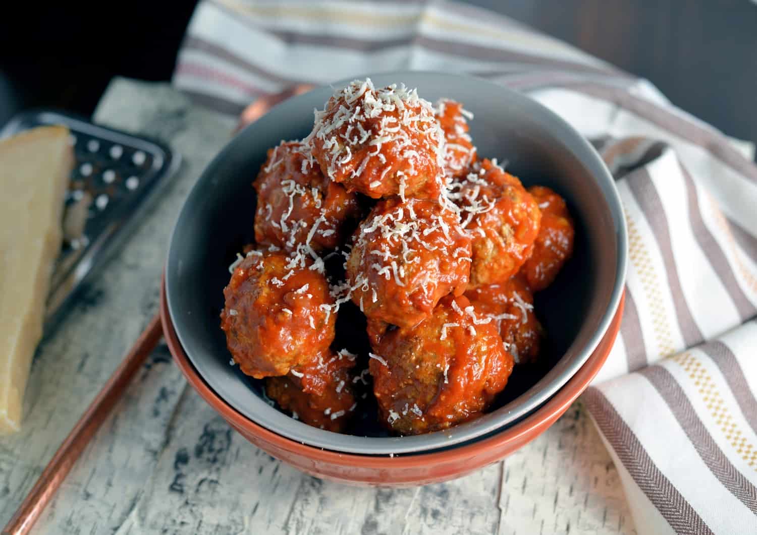 Italian meatballs in a gray bowl