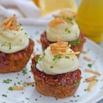 Using a simple meatloaf recipe, homemade meatloaf is turned into a mini version that is a fun meal for the whole family with these Mini Meatloaf Cupcakes. #meatloafmuffins #minimeatloaf #homemademeatloaf #simplemeatloafrecipe www.savoryexperiments.com