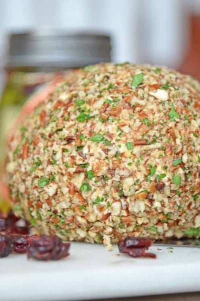 This cheese ball with cream cheese is a classic Party Cheese Ball recipe, made with simple ingredients. A must-make for any and all parties! #partycheeseballrecipe #creamcheeseball www.savoryexperiments.com