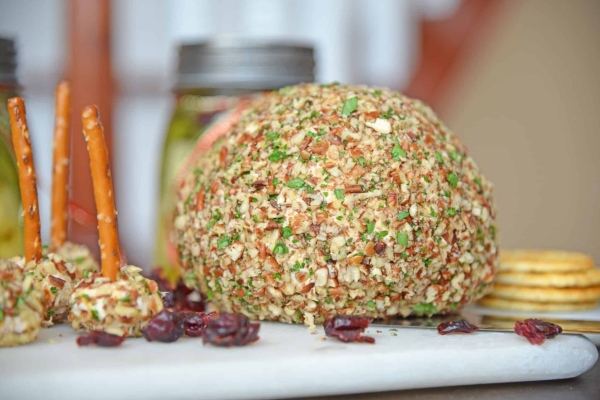 This cheese ball with cream cheese is a classic Party Cheese Ball recipe, made with simple ingredients. A must-make for any and all parties! #partycheeseballrecipe #creamcheeseball www.savoryexperiments.com
