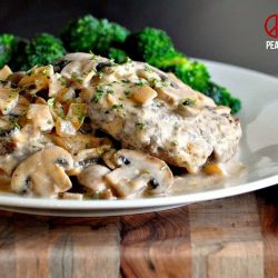 Stroganoff burger with broccoli on a white plate