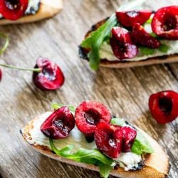 Fresh cherry salsa on a blue cheese bruschetta