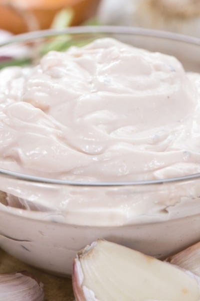 angled shot of bowl of aioli