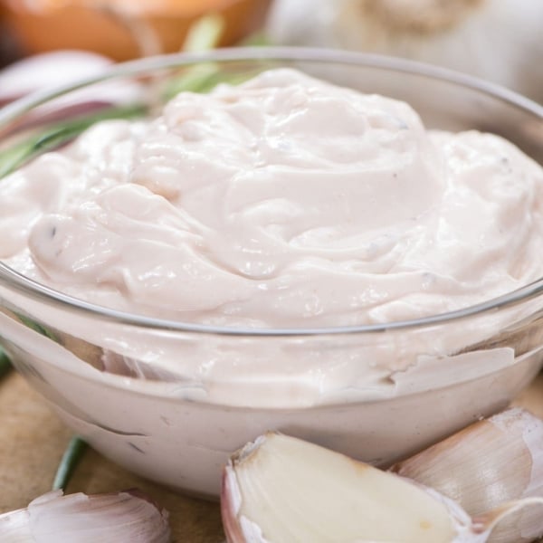 angled shot of bowl of aioli