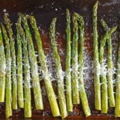 This delicious Asiago Asparagus is a quick and easy roasted asparagus recipe requiring only 4 ingredients and 15 minutes to prepare. #howtomakeasparagus #roastedasparagus www.savoryexperiments.com