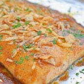 This BBQ Baked Salmon requires just 20 minutes and a handful of ingredients. Flavorful, quick and easy! Sure to become your favorite salmon recipe. #bakedsalmon #salmonrecipes www.savoryexperiments.com