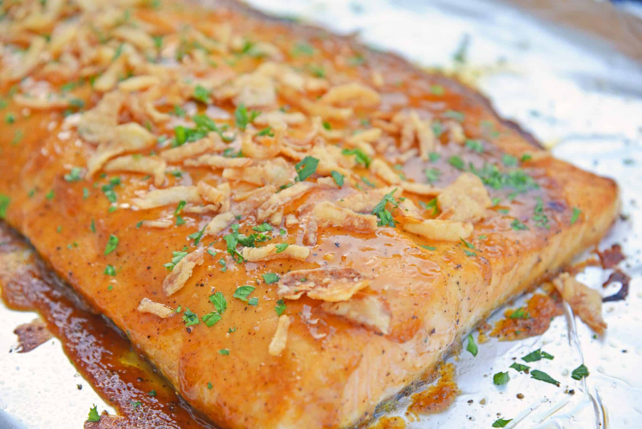 This BBQ Baked Salmon requires just 20 minutes and a handful of ingredients. Flavorful, quick and easy! Sure to become your favorite salmon recipe. #bakedsalmon #salmonrecipes www.savoryexperiments.com