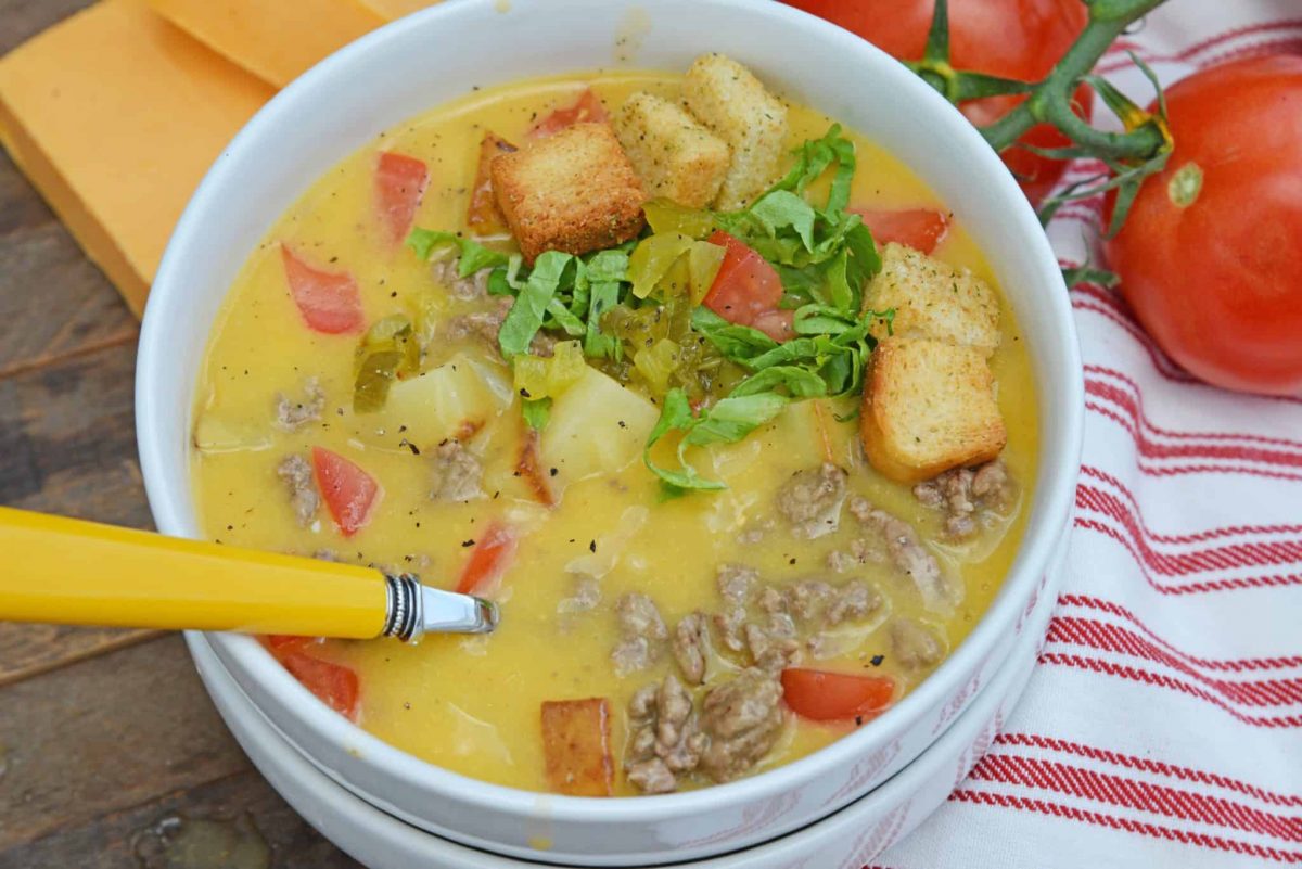 Bacon Cheeseburger Soup takes classic Cheeseburger Soup and adds BACON! Your favorite comfort food in soup form, does it get any better? #baconcheeseburgersoup #cheeseburgersoup www.savoryexperiments.com