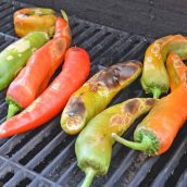 Step-by-step instructions with pictures on how to roast Hatch chile peppers. Roast, peel and seed super easy! #howtoroasthatchchilepeppers #hatchchile www.savoryexperiments.com