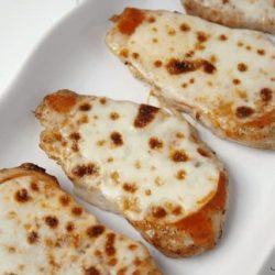 Buffalo pork chops on a white platter