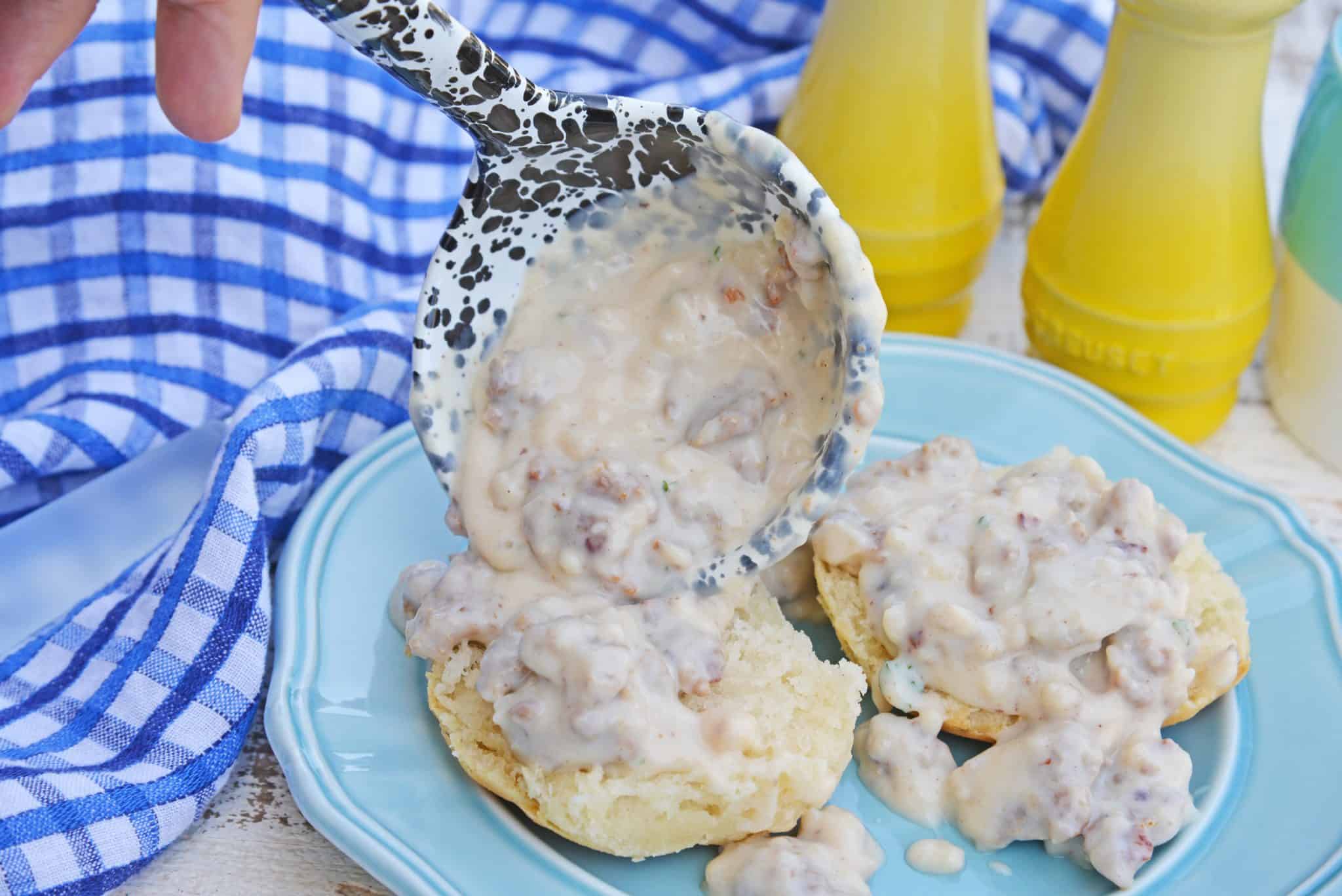 Creamy Sausage Gravy, a simple recipe made from pork sausage and cream and a few other ingredients, is a Southern staple. Serve over warm biscuits,  fried chicken or chicken fried bacon. #sausagegravy #breakfastgravy www.savoryexperiments.com 