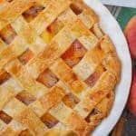 Southern Peach Pie a traditional peach pie using fresh peaches baked in a flaky, buttery lattice crust. #southernpeachpie #peachpie www.savoryexerperiments.com